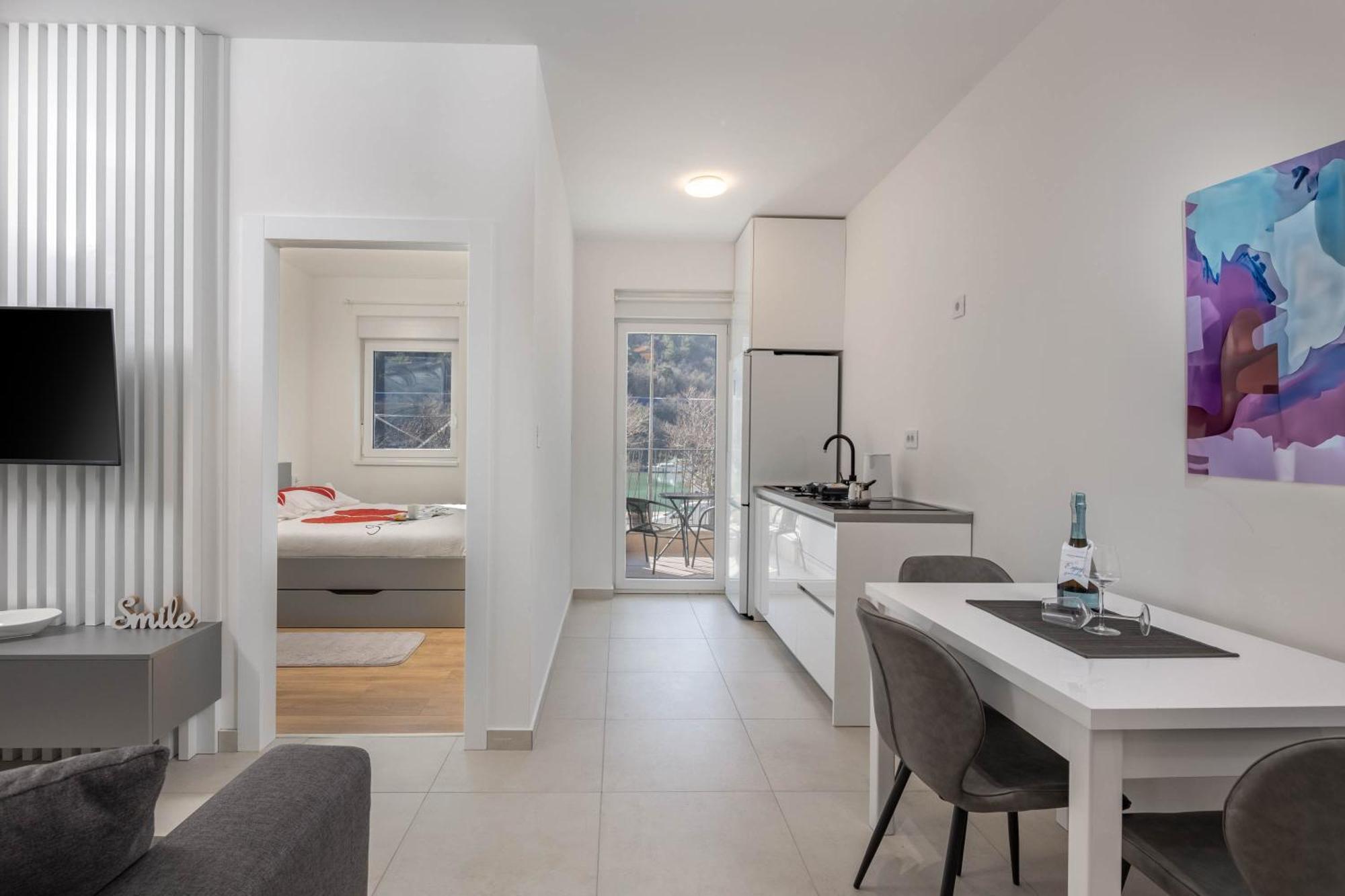 Seafront Villa Andrijana - Happy Rentals Plomin Bagian luar foto