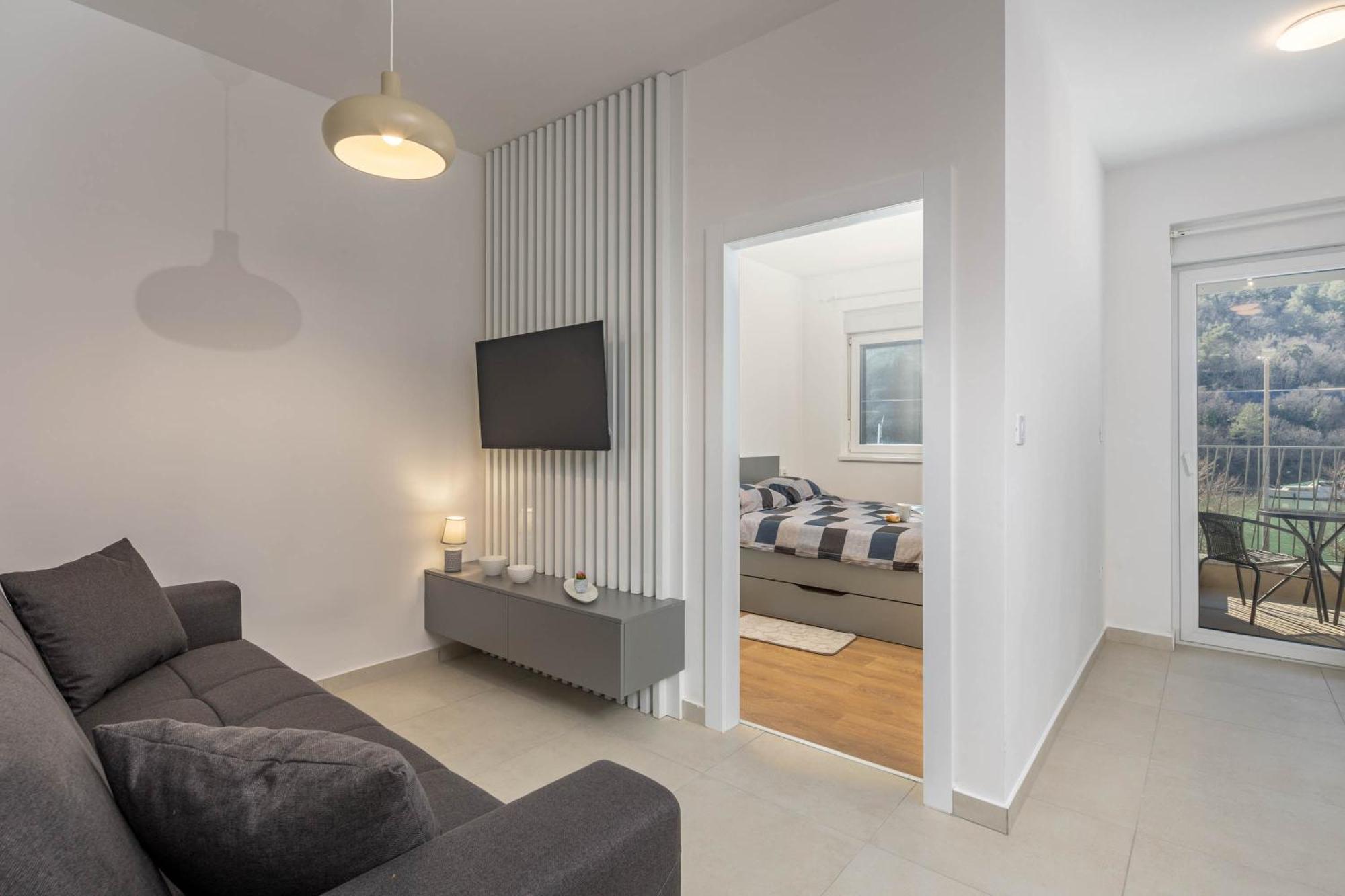 Seafront Villa Andrijana - Happy Rentals Plomin Bagian luar foto